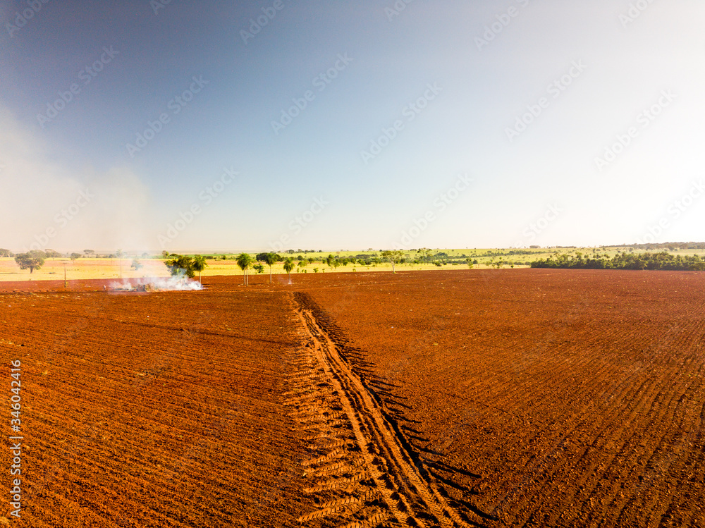 Aerial view of land prepared for planting and cultivating the crop - Photo of drone of plowed land on farm