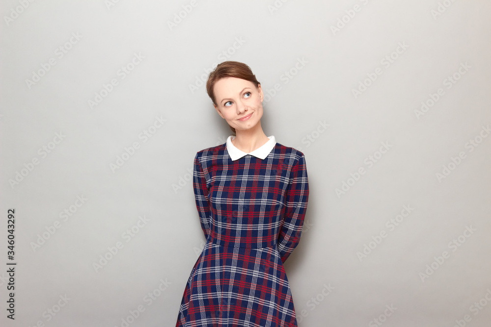 Portrait of happy dreamy girl imagining something pleasant in mind Portrait of happy dreamy girl imagining something pleasant in mind