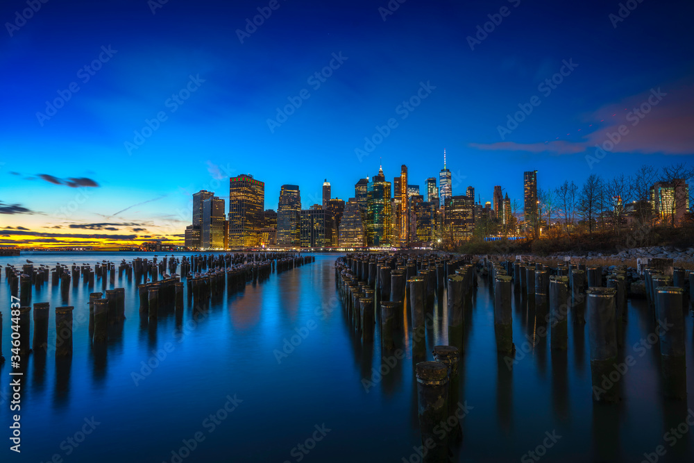 Famous Skyline of downtown New York, Brooklyn Bridge and Manhattan at night , New York City USA .