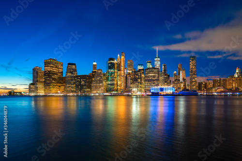 Famous Skyline of downtown New York, Brooklyn Bridge and Manhattan at night , New York City USA . © MERCURY studio