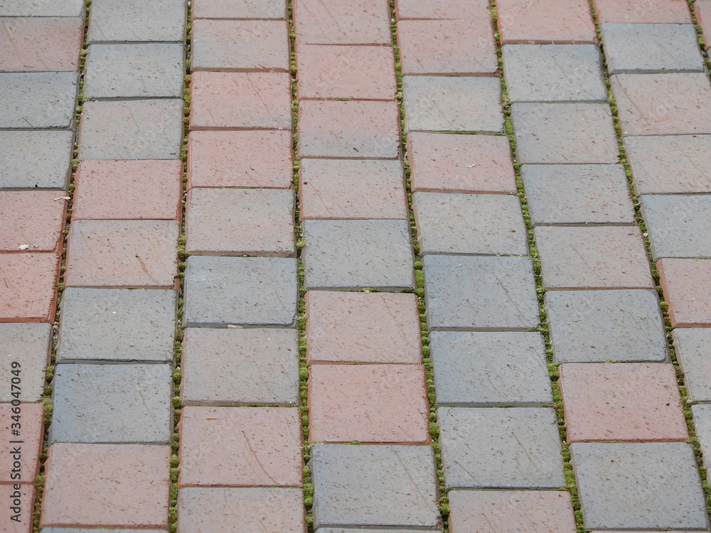 Fototapeta premium Perspective View Red Gray Grey Brick Stone Street Road Sidewalk Pavement Texture Background
