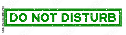 Grunge green do not disturb word square rubber seal stamp on white background