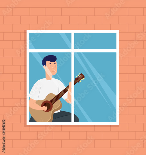 young man stay at home playing guitar in window design