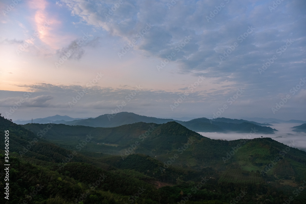 Scenery of mountains under mist in the morning in Thailand. Scenery of mountains under mist in the morning in Thailand.