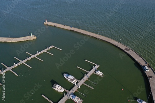 Принти на полотні Small sea lagoon port and two lighthouses on pier, aerial view