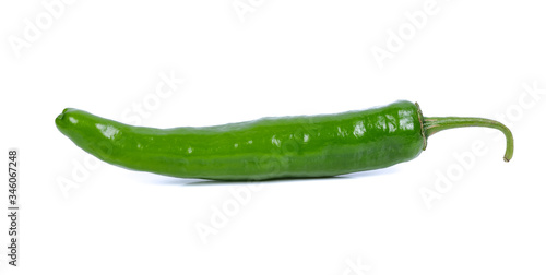 Leinwand Poster green chilli pepper on white background
