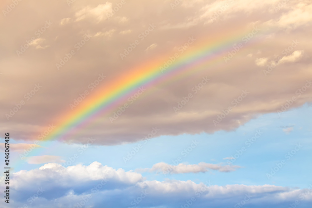 Rainbow  light on  wonderful sky with brown clouds