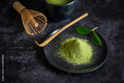 Japanese matcha tea  in bowl on black background