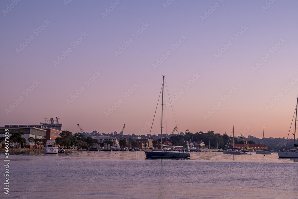 purple dawn with yacht