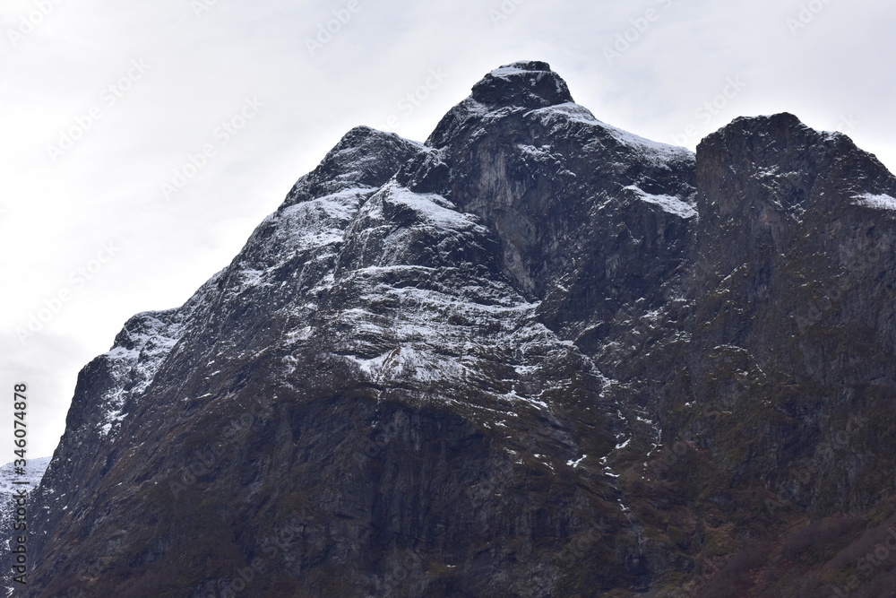 landscape rock mountain with snow  in winter
norway fjord