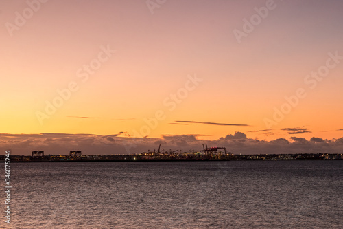 dawn at a shipping port © Tim