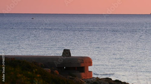 Spanish coastline.  War bunker on Torrecarbonera beach, Punta Mala, Andalusia Spain photo