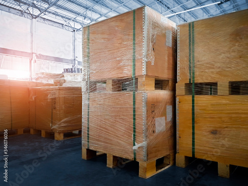 Stacked of Wooden Crates in Storage Warehouse. Supply Chain. Storehouse Commerce Cargo Shipment. Warehouse Shipping Logistics. photo