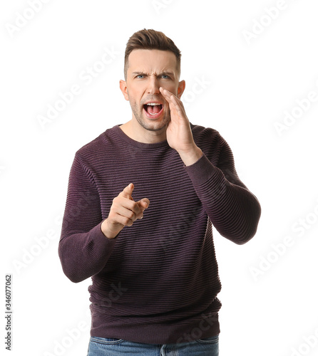 Angry screaming young man o...