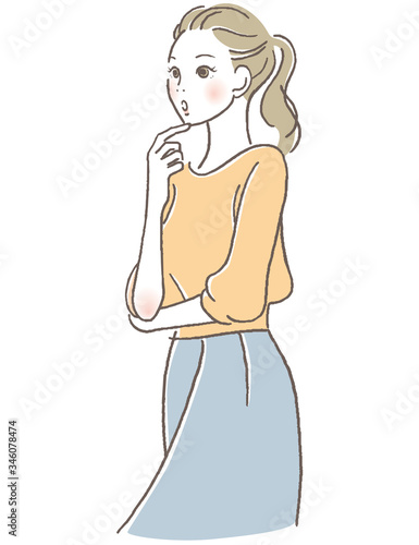 顎に指を添える女性　考える