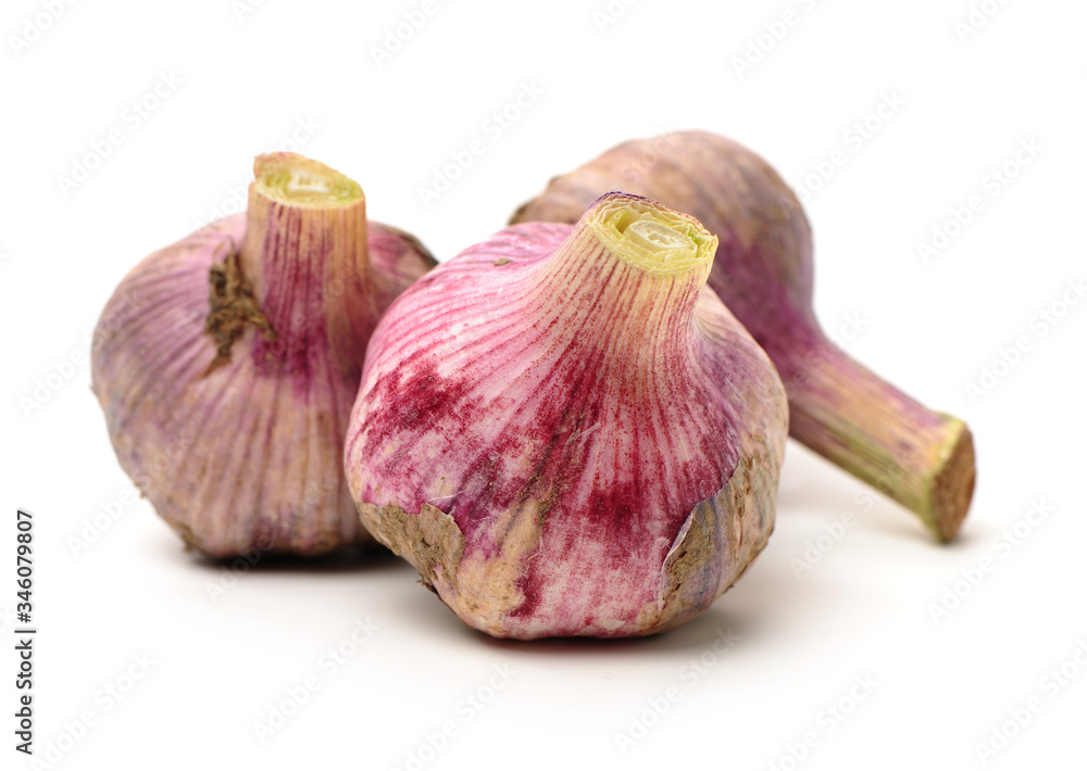 Fototapeta premium Fresh young garlic isolated on white background