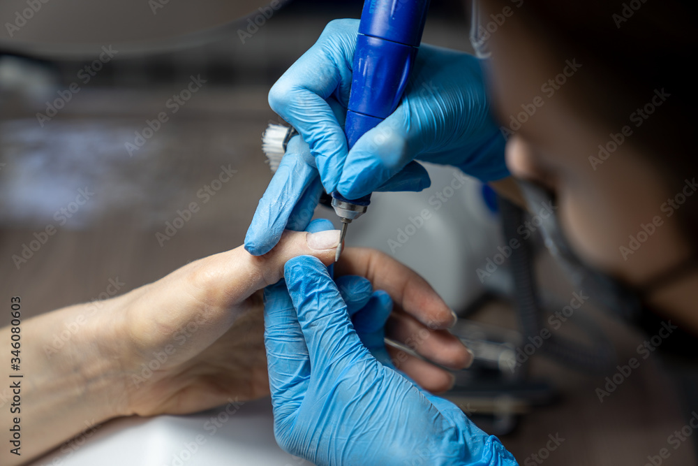 professional gamblet processing of nails by a manicurist