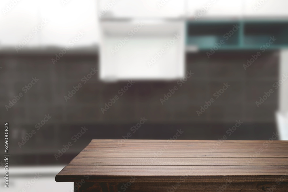 Wood desk space and blurred of kitchen background. for product display montage. business presentation. Wood desk space and blurred of kitchen background. for product display montage. business presentation.