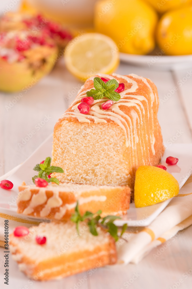 Lemon sponge cake with pomegranate.
