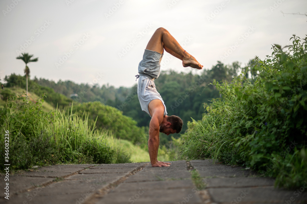 Fototapeta premium Man practice Yoga practice and meditation outdoor.