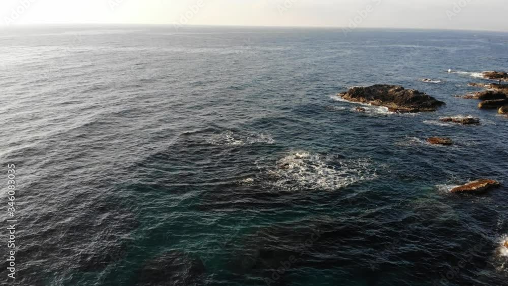 Aerial view. Sea water with stone rocky shore. Spanish coast nature. Mediterranean Sea Aerial view. Sea water with stone rocky shore. Spanish coast nature. Mediterranean Sea