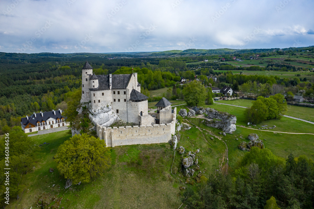 Aerial view of Castle Bobolice, one of the most beautiful fortresses on the Eagles Nests trail. Medieval fortress in the Jura region near Czestochowa. Poland.