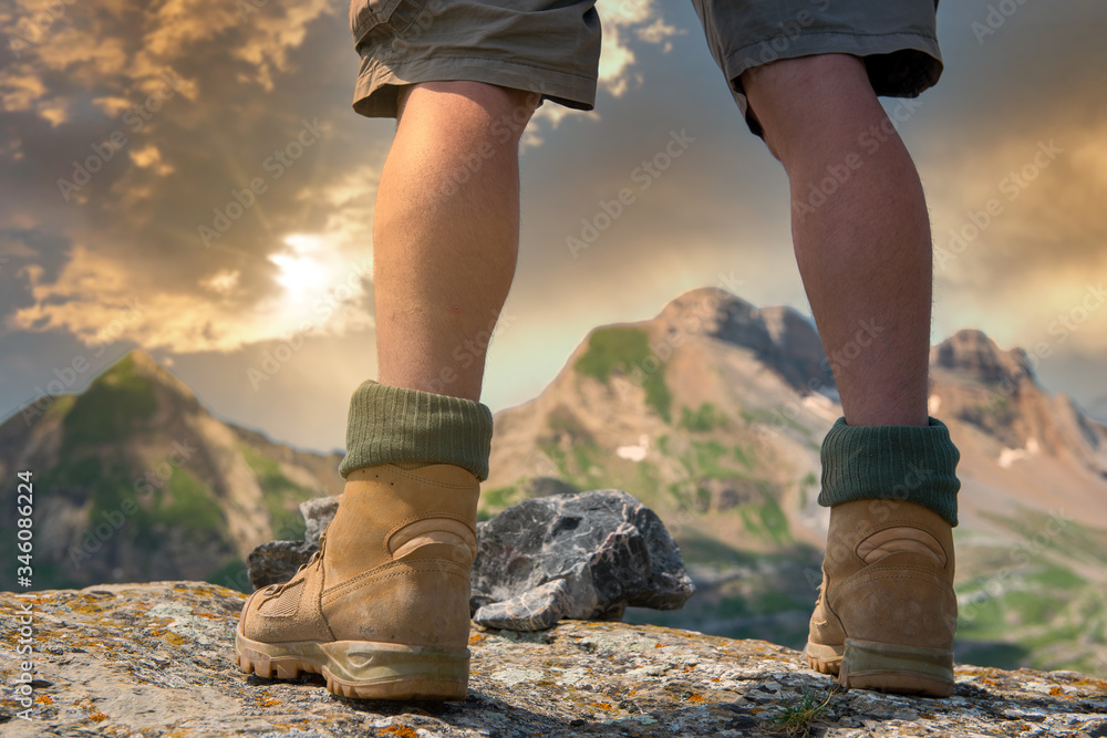 close-up of a hiker's foots in the mountain - obrazy, fototapety, plakaty 