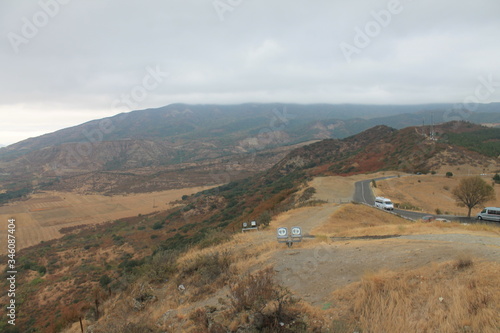 Wallpaper Mural view from the city of Queen Tamara mountain in the fog at the foot of the house flows the river and the highway Georgia Torontodigital.ca