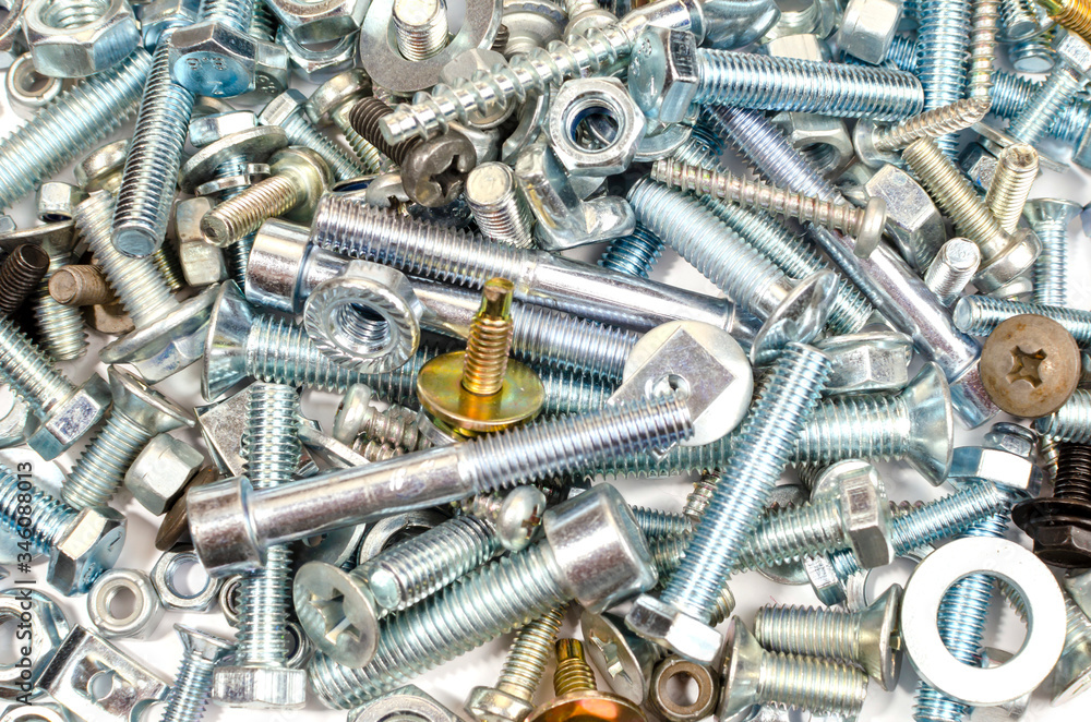 lots of metal bolts for construction and repair as a background lots of metal bolts for construction and repair as a background