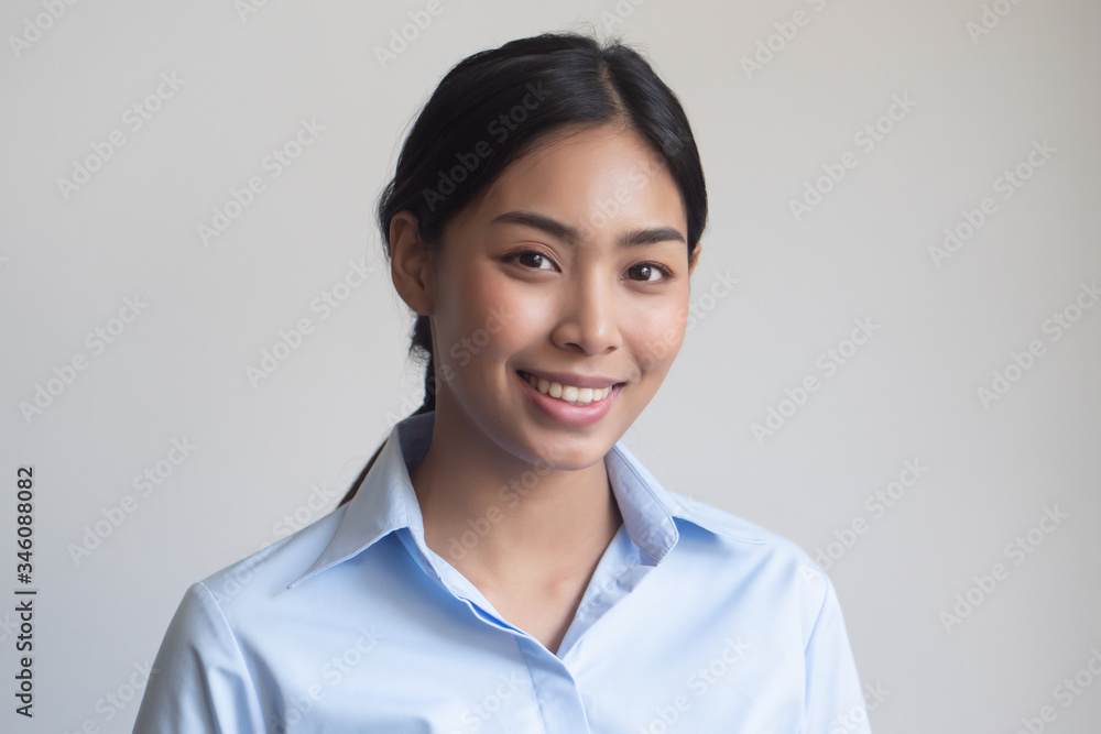 face portrait of happy smiling girl; portrait of positive relaxed happy smiling asian woman smiles on isolated background; young adult southeast asian woman model face portrait of happy smiling girl; portrait of positive relaxed happy smiling asian woman smiles on isolated background; young adult southeast asian woman model