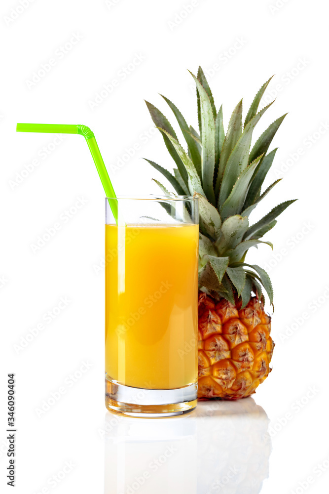 Pineapple and juice isolated on a white background. Pineapple and juice isolated on a white background.