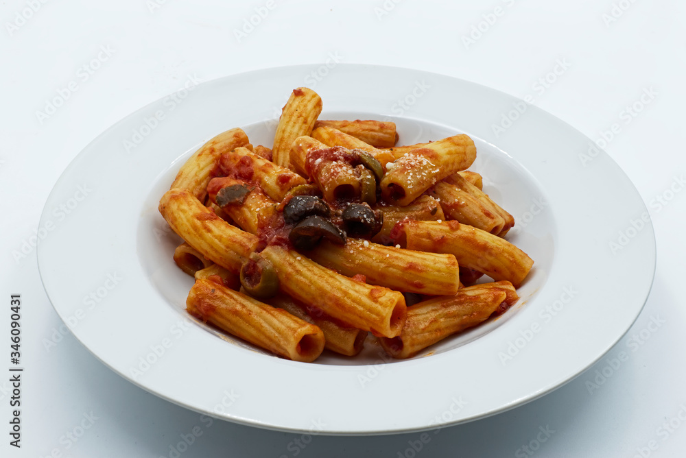 Maccheroni with olive sauce and parmesan, isolated on white. Italian pasta Maccheroni with olive sauce and parmesan, isolated on white. Italian pasta