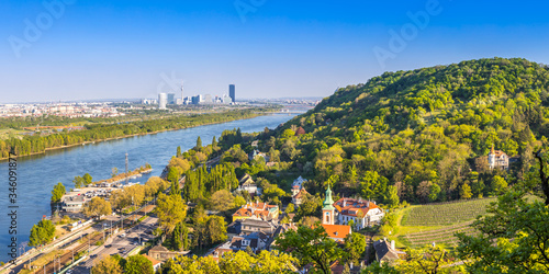 View of Vienna suburbs - Kahlenbergdorf with view of danube river, danube island and Vienna skyline in the back, Austria photo