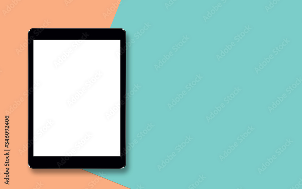 tablet black touch screen on background orange and green pastel. tablet black touch screen on background orange and green pastel.