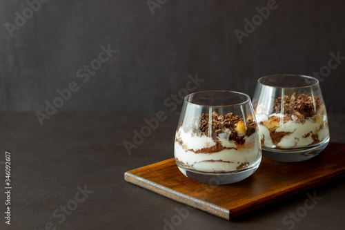 Italian dessert tiramisu in a glass. National cuisine. Traditional recipe.