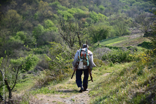 A Korean rural old man walking with a A-frame.
