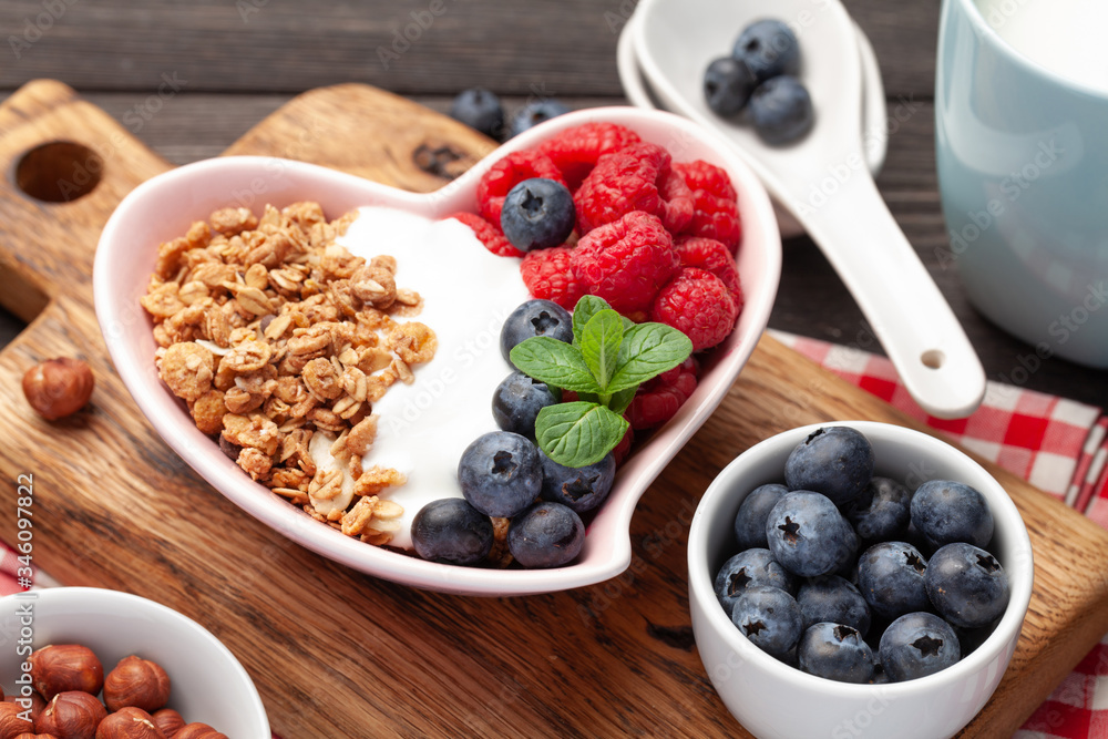 Healthy breakfast with granola, yogurt and berries Healthy breakfast with granola, yogurt and berries
