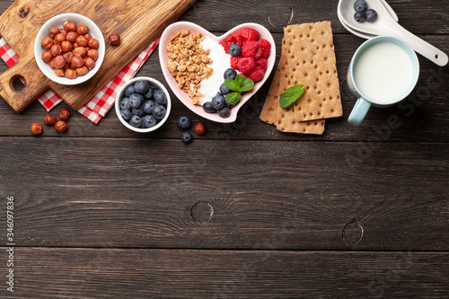 Healthy breakfast with granola, yogurt and berries