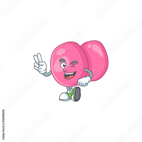 Cheerful streptococcus pyogenes mascot design with two fingers