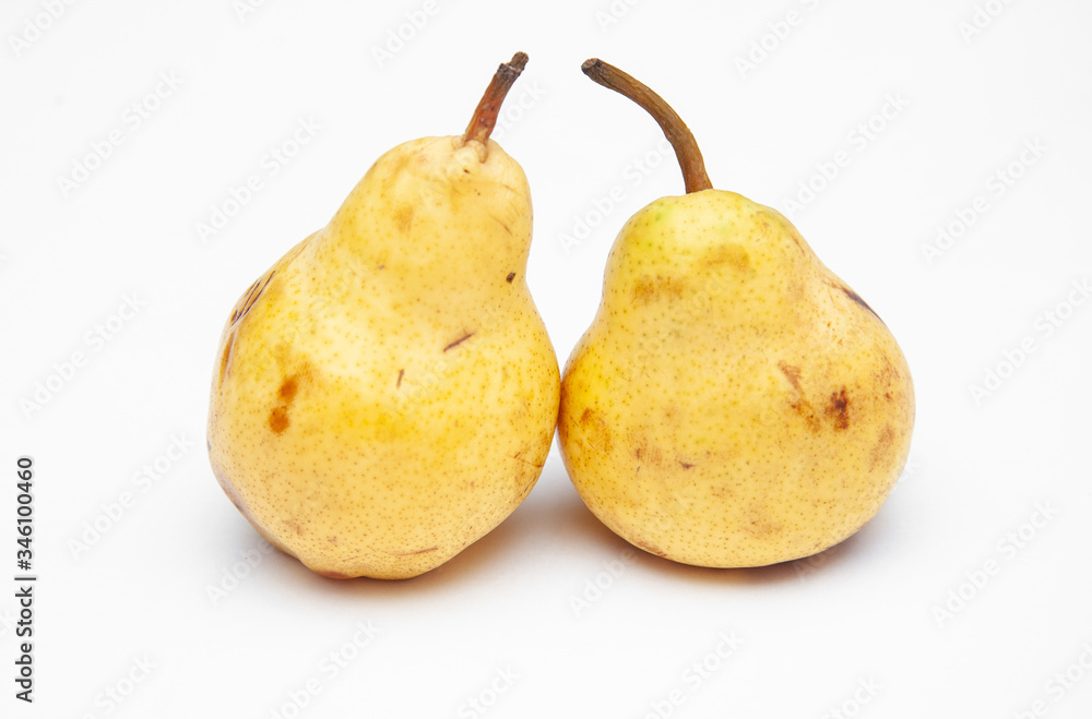 two yellow ripe pears on a white background two yellow ripe pears on a white background