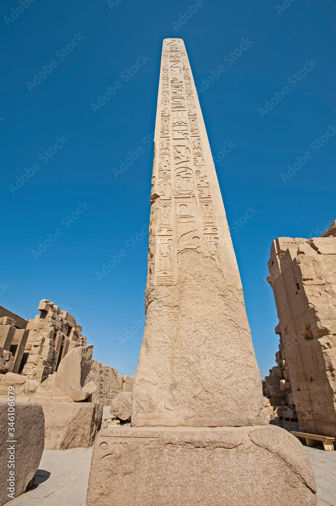 Obelisk with hieroglyphics and ancient egyptian Karnak Temple