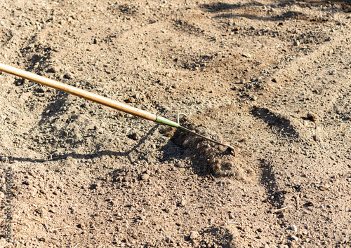 Preparing a ground with mesh to prevent weeds from growing and installing drip irrigation