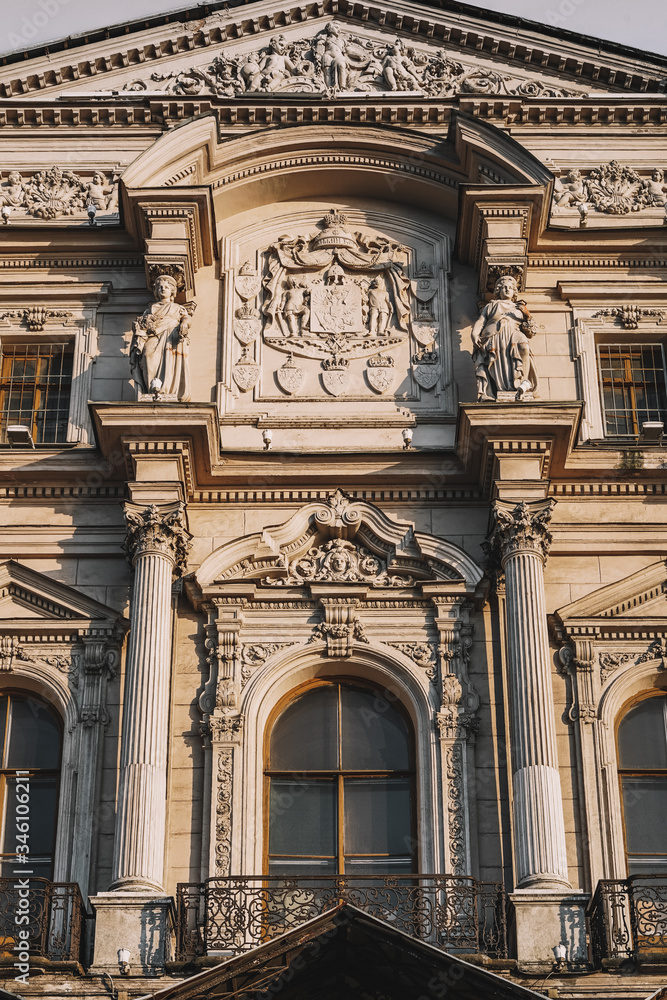 Fototapeta premium Beautiful historical facades of buildings in Saint Petersburg, magnificent architecture, sculptures and columns, marble