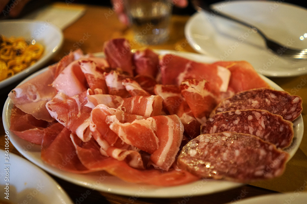 Close up dish of Antipasto prosciutto ham and salami