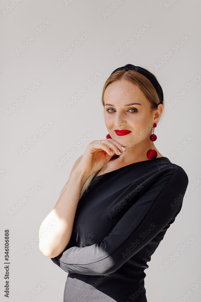 beautiful woman model posing in elegant dress in the studio beautiful woman model posing in elegant dress in the studio
