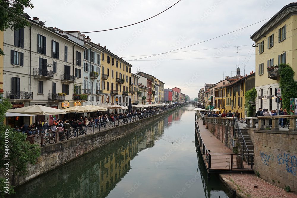 Exterior architecture and decoration of Naviglio Grande located in Navigli district, Milan's historic canal and antique market shop- Italy