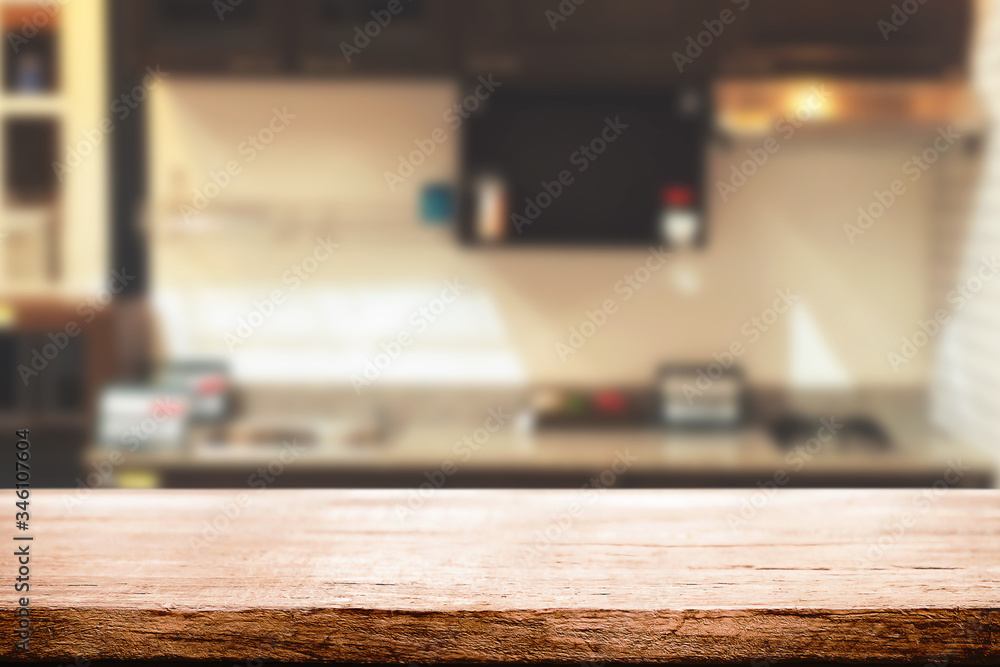 Wood desk space and blurred of kitchen background. for product display montage. business presentation. Wood desk space and blurred of kitchen background. for product display montage. business presentation.