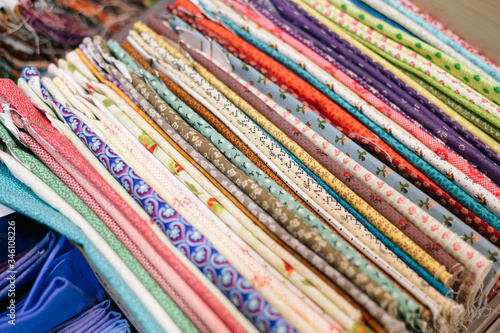 Bundle of colored fabric. (Texture, lines, pattern, composition, handmade)