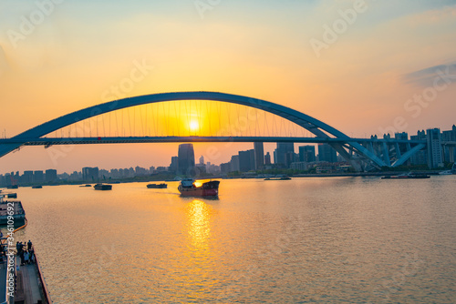 Sunset view of Lupu Bridge, Shanghai, China © Weiming