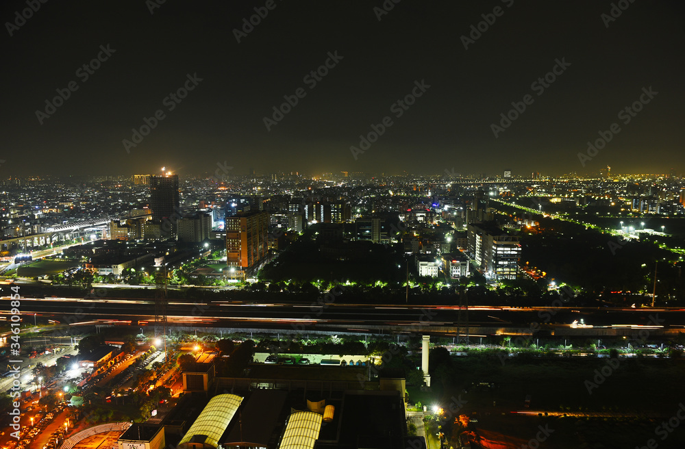 Cityscape of Noida Uttar Pradesh covering NH 9 and Electronic City Noida. Residential and Commercial Hub. - Night View